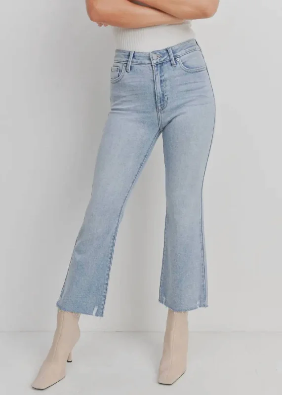 Sweet breath High Rise Crop Flare With Distressed Hem Jean In Light Denim